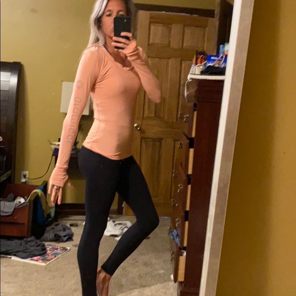 Long sleeved peachy pink yoga tee